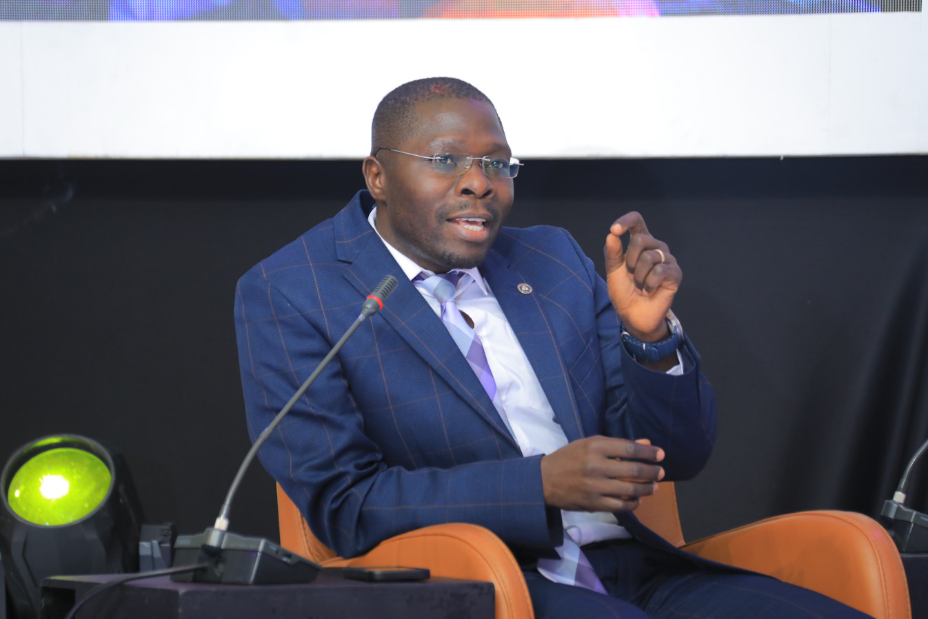 Mustapha B. Mugisa speaking at a conference